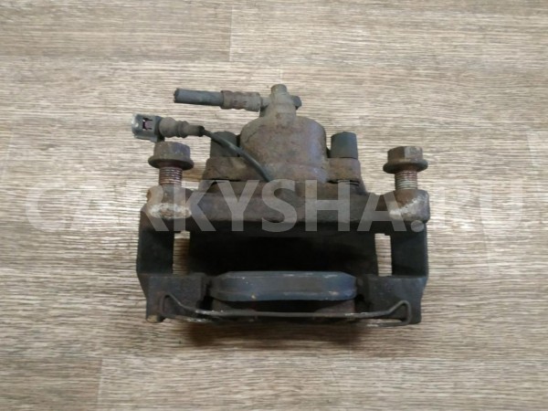 Суппорт тормозной передний левый Volkswagen Tiguan 