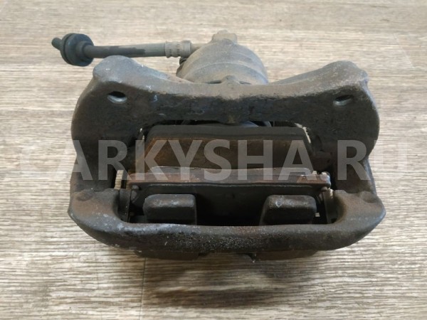 Суппорт тормозной передний левый Chevrolet Orlando 