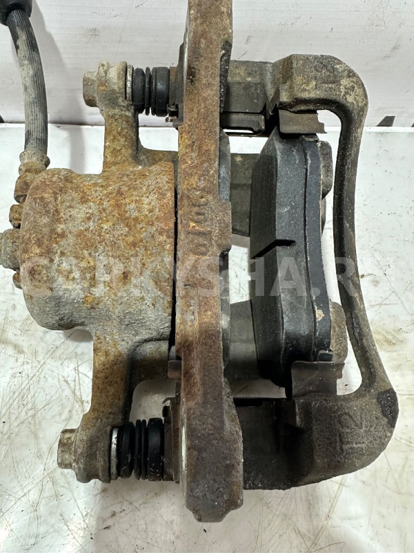 Суппорт передний правый Chevrolet Aveo T250 Chevrolet Aveo оригинальный номер 94566891