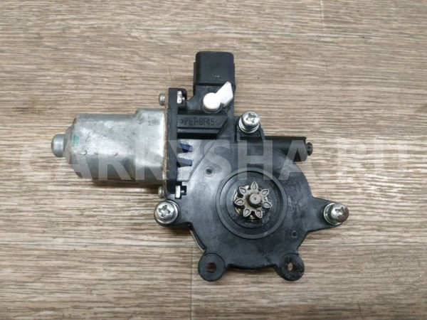 Моторчик стеклоподъемника Mitsubishi Lancer 