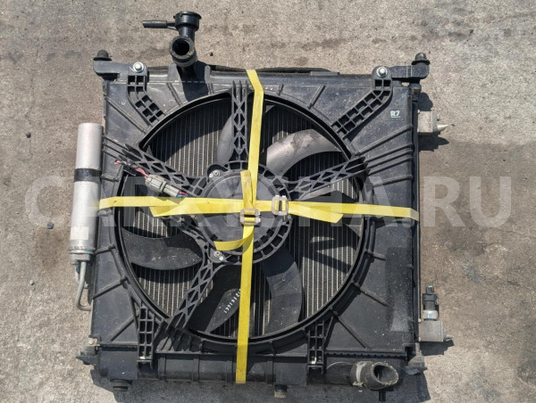 Диффузор радиатора Nissan Note оригинальный номер 214811HC0A