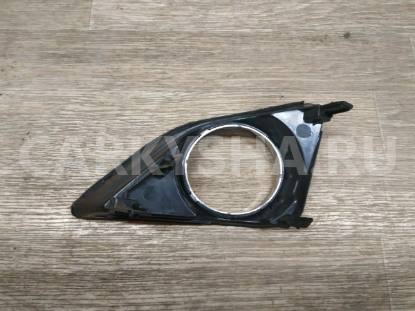 Накладка противотуманной фары правая Toyota Corolla 