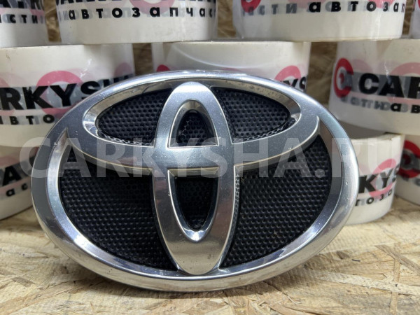 Эмблема переднего бампера Toyota Camry VI (XV40) оригинальный номер 75311-33130