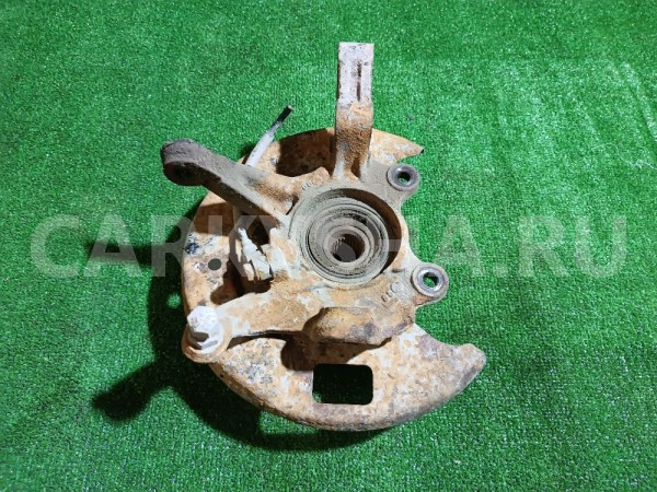 Кулак поворотный передний левый Nissan Avenir 