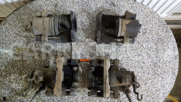 Суппорта передние, задние Фольксваген Гольф 6 Audi 200 оригинальный номер 5K0615423