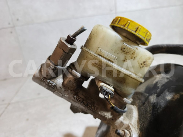 Усилитель тормозов вакуумный Nissan Bluebird оригинальный номер 472100E801