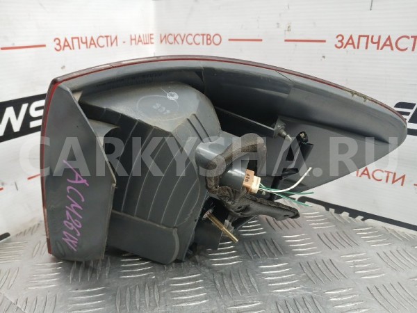 Фонарь стоп сигнала левый Toyota Ipsum 