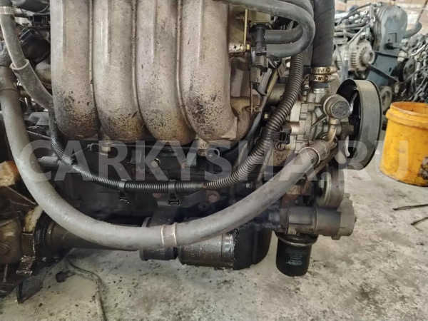 Двигатель Mitsubishi Grandis оригинальный номер 1000A254