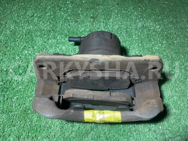 Суппорт тормозной Toyota Camry оригинальный номер 4775033190