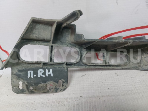 Кронштейн переднией правой фары Opel Astra J Opel Astra оригинальный номер 13368882