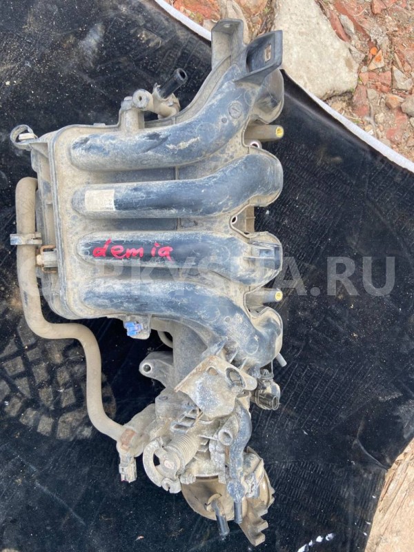 Коллектор впускной Mazda Demio IDY (2002—2007) Mazda 2 оригинальный номер ZJ0113100B