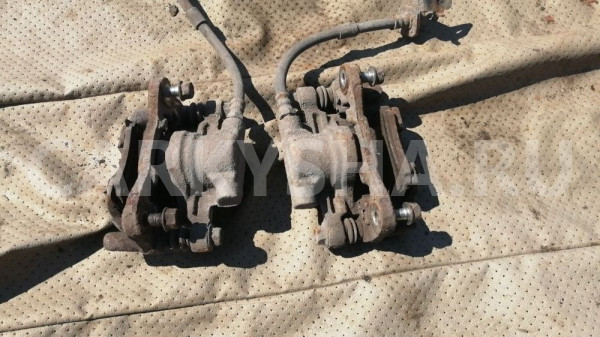 Суппорт задний Mitsubishi Lancer 10 Mitsubishi Lancer оригинальный номер 4605A477