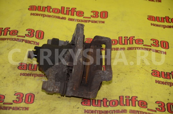 Суппорт тормозной задний левый Kia Soul 