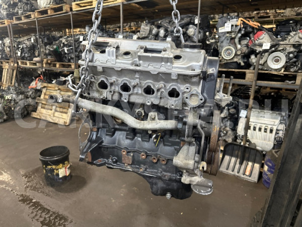 Двигатель Mitsubishi Lancer 9 2005-2011 1000A512, передний Mitsubishi Lancer 