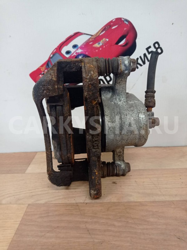 суппорт тормозной передний левый Chevrolet Aveo 