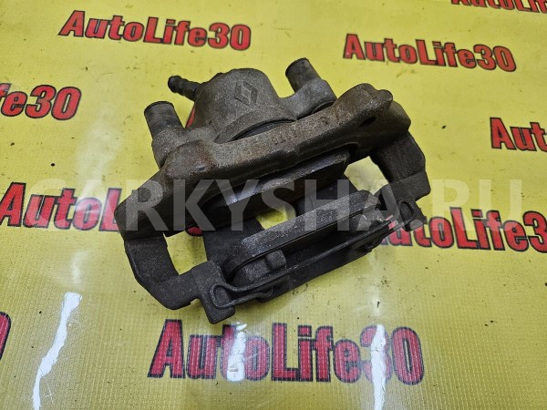 Суппорт тормозной передний левый Renault Sandero 