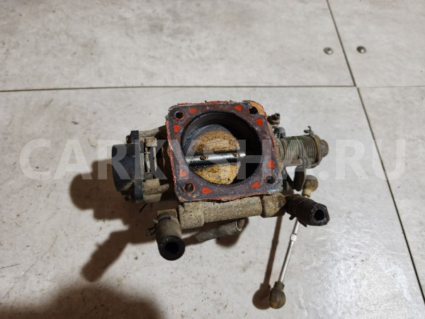 Заслонка дроссельная механическая Nissan Bluebird оригинальный номер 1611953J00