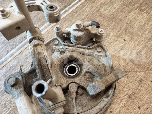 Кулак поворотный задний левый Subaru Legacy оригинальный номер 28012AA055