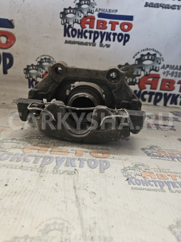 Суппорт тормозной Volkswagen Passat 