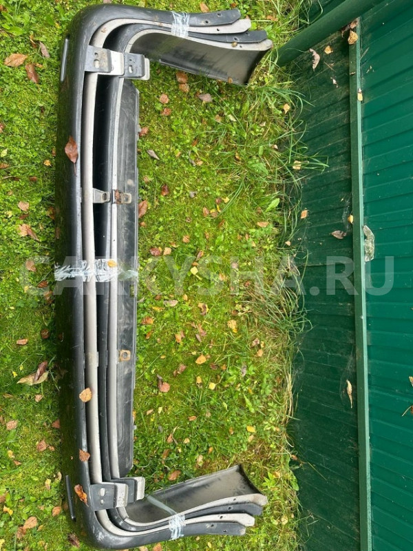 Бампер задний Ланд Круизер 100 Toyota Land Cruiser 100 Series оригинальный номер 5215960181
