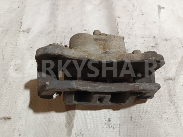 Суппорт тормозной передний правый Mitsubishi Diamante 