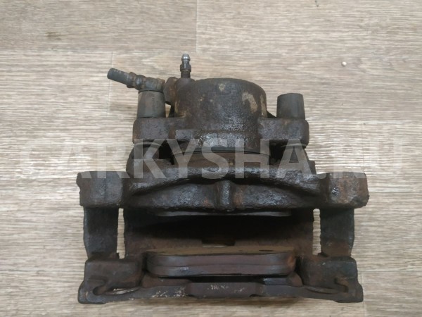 Суппорт тормозной передний левый Land Rover Freelander 