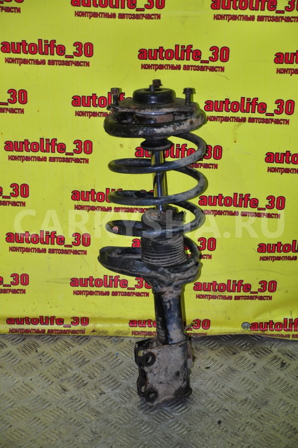 Стойка подвески Mitsubishi Lancer 