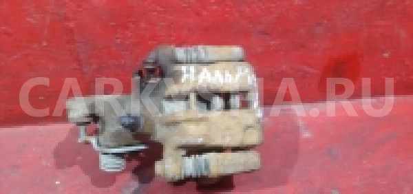 Суппорт задний левый Nissan Almera N16 Альмера Nissan Almera 