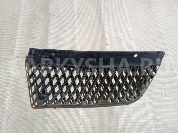 Решетка радиатора левая Mitsubishi Lancer оригинальный номер 7450A195