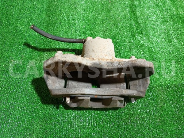 Суппорт тормозной передний левый Mitsubishi Lancer 