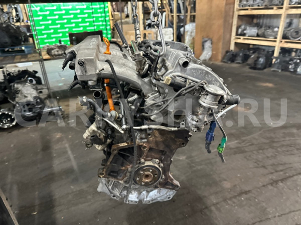 Двигатель Audi A4 06B100032X AMB Audi 100 