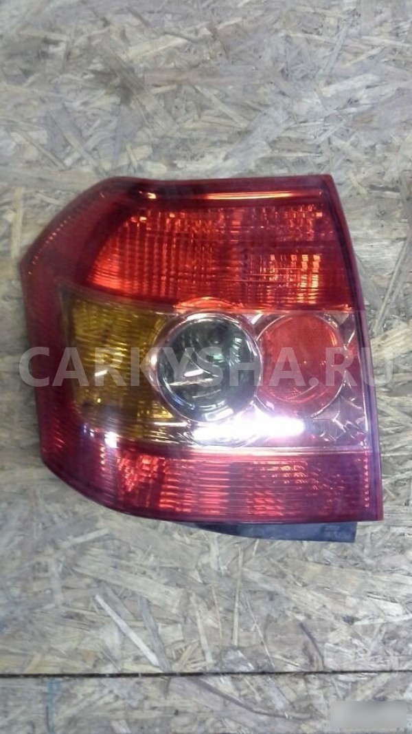 Фонарь задний левый Тойота Королла Toyota Corolla оригинальный номер 8156102310