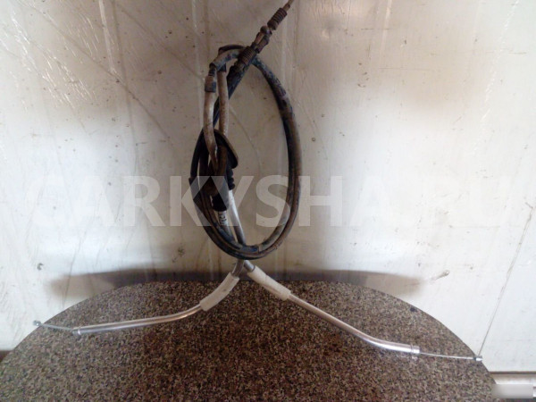 Трос стояночного тормоза левый Фольксваген Джетта Volkswagen Jetta оригинальный номер 5C0609721BC