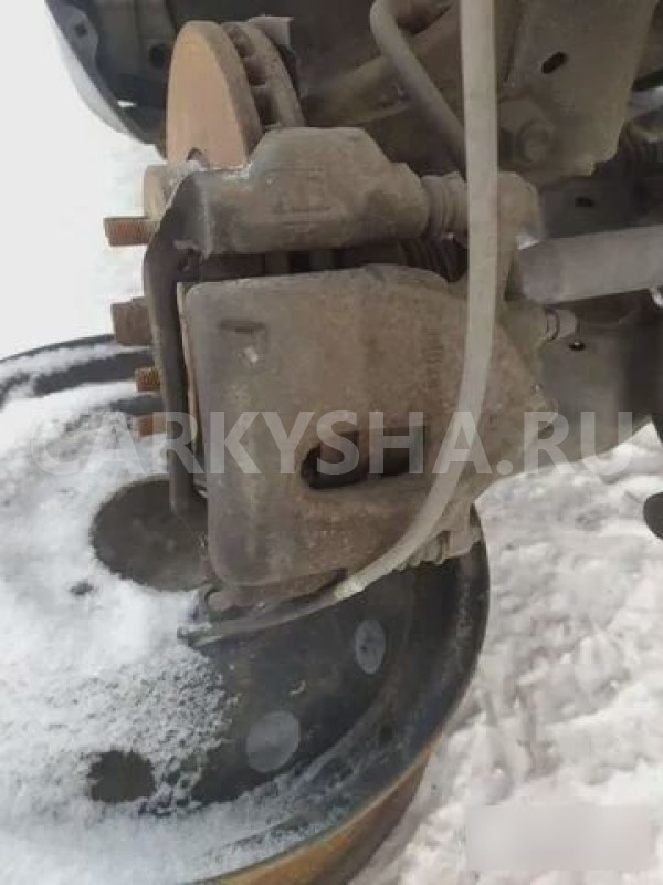Суппорт левый передний Toyota Auris E150 Toyota Auris 