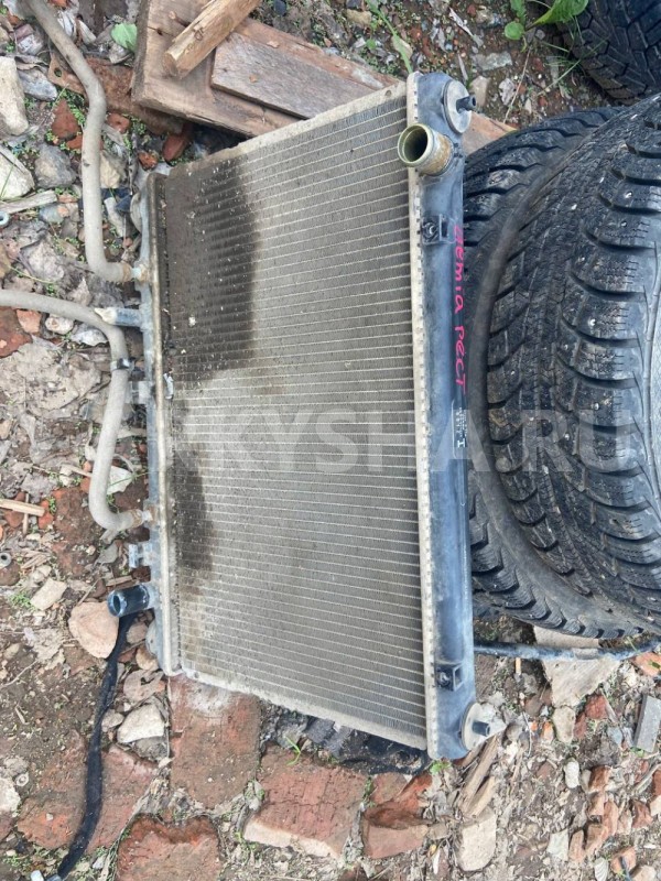 Радиатор охлаждения Mazda Demio IDY (2002—2007) Mazda 2 оригинальный номер 422000-6850