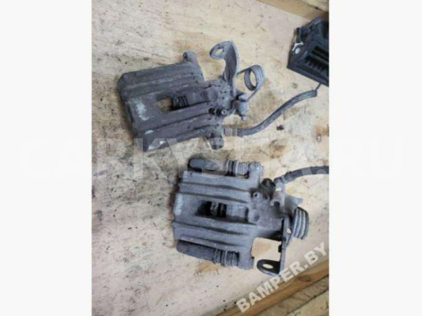 Суппорт Audi A4 B6 (2000—2006) Audi 200 оригинальный номер 8E0615423