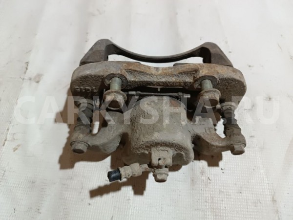 Суппорт тормозной передний правый Nissan NV200 