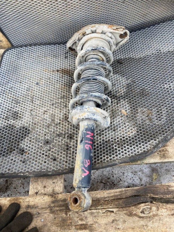 Амортизатор задний Nissan Almera N16 рестайлинг (2002—2006) Nissan Almera оригинальный номер QG18DE