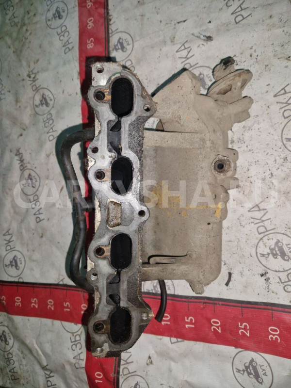 Коллектор впускной Mazda 626 (GE) Mazda 2 оригинальный номер FS0113100E