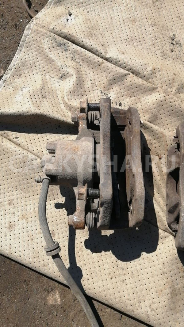 Суппорт передний левый Mitsubishi Lancer 10 Mitsubishi Lancer оригинальный номер 4605A475