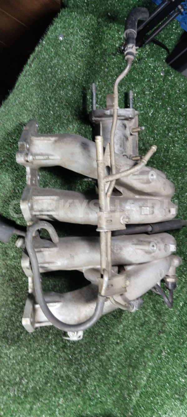 Коллектор впускной на Toyota Carib 4AFE Toyota Sprinter Carib оригинальный номер 1710116190