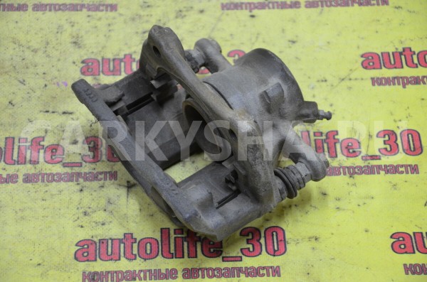 Суппорт тормозной передний правый Nissan Almera 