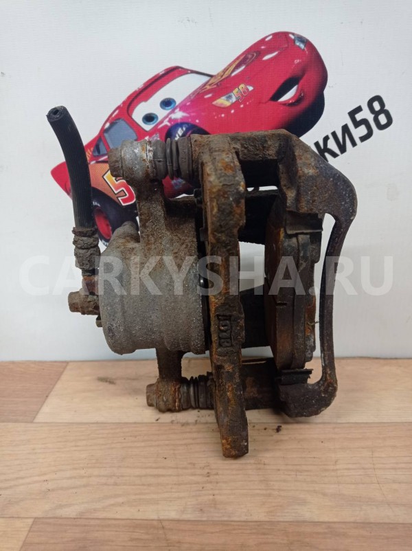 суппорт тормозной передний правый Chevrolet Aveo 