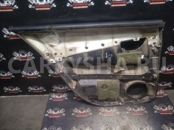 Обшивка задней правой двери  Ниссан Примера Р12 Nissan Primera оригинальный номер 82900BA010