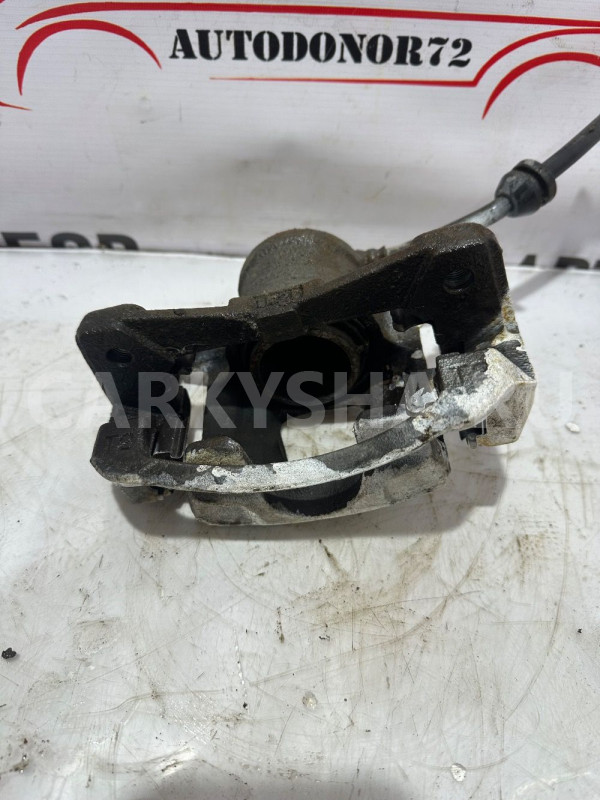 Суппорт передний правый Chevrolet Aveo T250 Chevrolet Aveo оригинальный номер 94566891