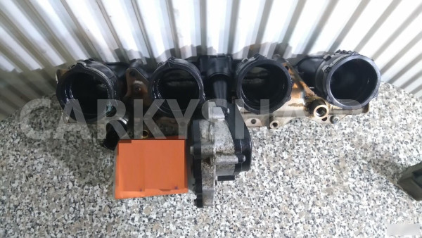 Электродвигатель заслонки впускного коллектора VW Volkswagen Passat оригинальный номер 06D133209T