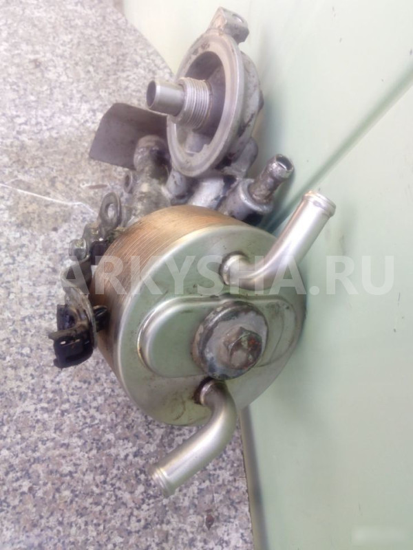 Радиатор масляный 4D56U Митцубиси Л 200 л200 Mitsubishi i оригинальный номер 1240A008
