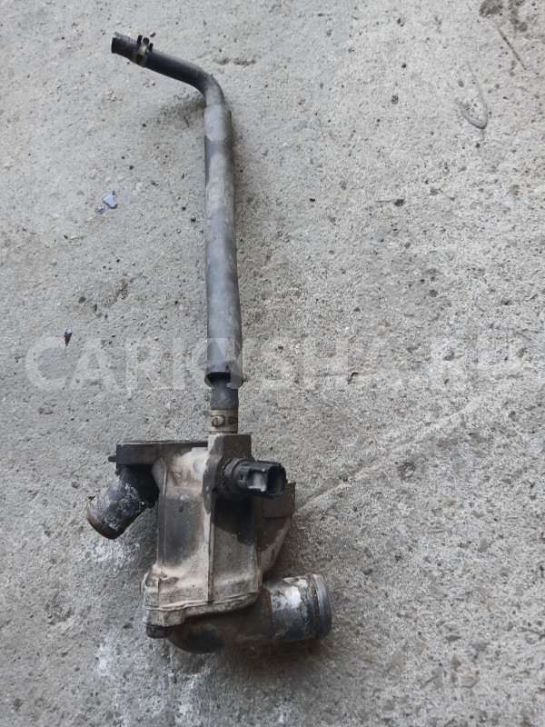 Корпус термостата Mitsubishi Lancer 9 Mitsubishi i оригинальный номер MD358257