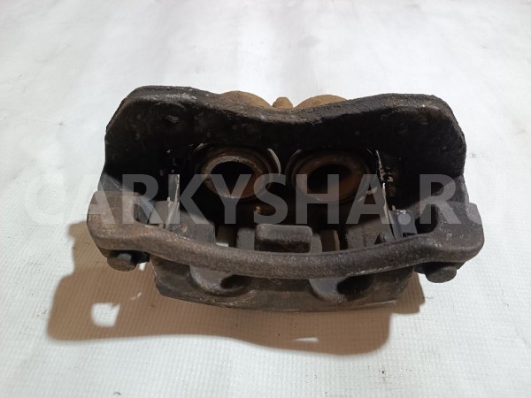 Суппорт тормозной передний левый Kia Sorento 