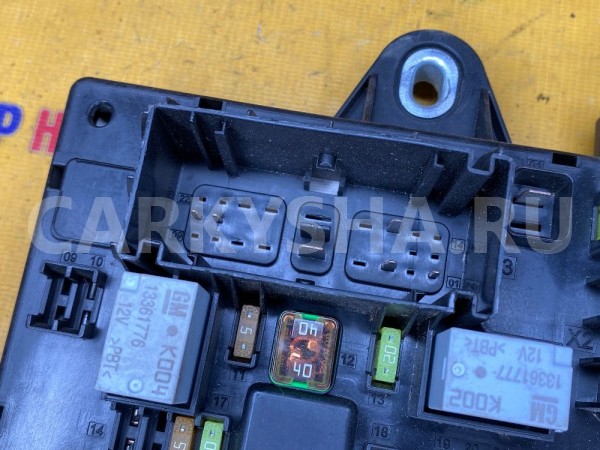 Блок предохранителей салонный зад Opel Astra J GTC Opel Astra оригинальный номер 13449201